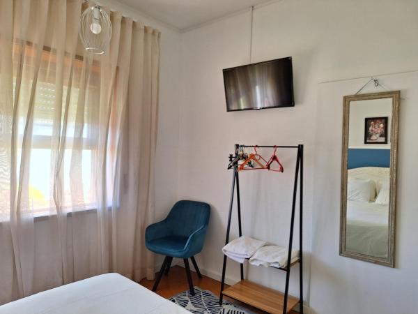 Villa Margarida : photo 1 de la chambre chambre lit queen-size - vue sur jardin