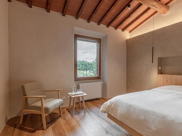 La Casa Rosa bnb : photo 3 de la chambre chambre triple avec salle de bains privative