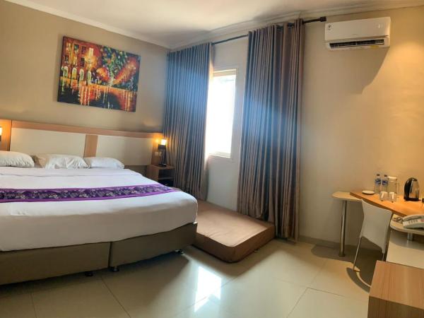 Laxston Hotel : photo 6 de la chambre chambre deluxe double ou lits jumeaux