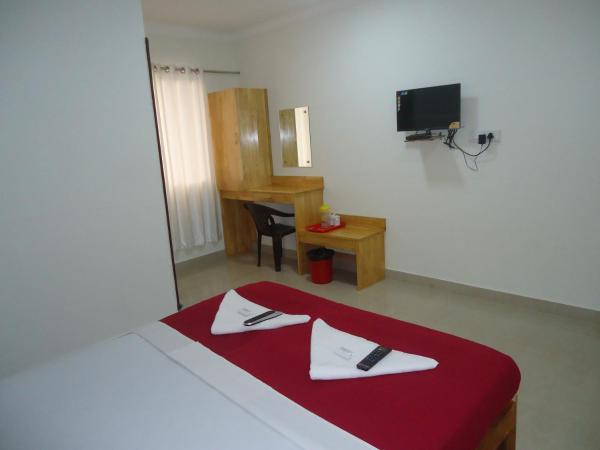 A V Residency : photo 5 de la chambre chambre triple deluxe