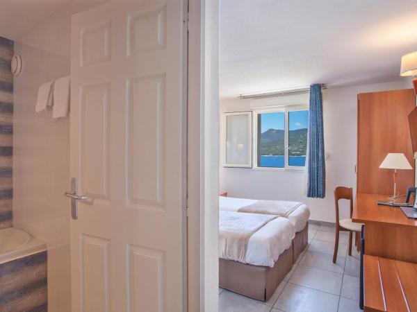 Le Neptune & Spa : photo 4 de la chambre chambre lits jumeaux - vue sur mer
