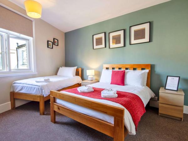 The Green W7 : photo 1 de la chambre chambre triple avec douche