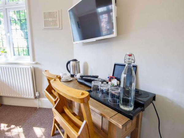 The Green W7 : photo 3 de la chambre chambre triple avec salle de bains commune