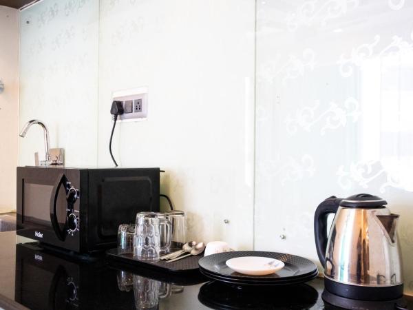 Mystic Apartotel Hebbal : photo 3 de la chambre suite deluxe avec lit king-size