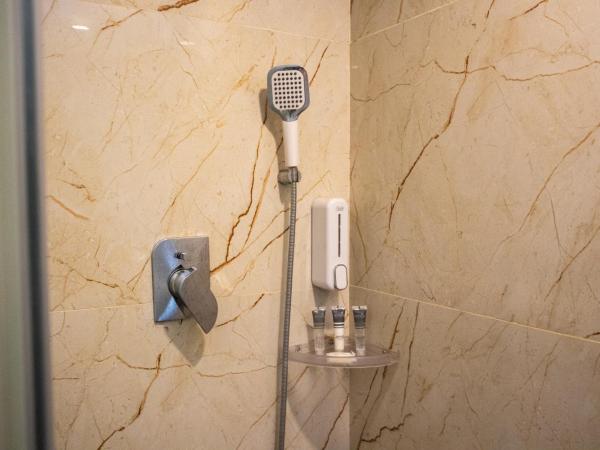 Mystic Apartotel Hebbal : photo 4 de la chambre suite deluxe avec lit king-size