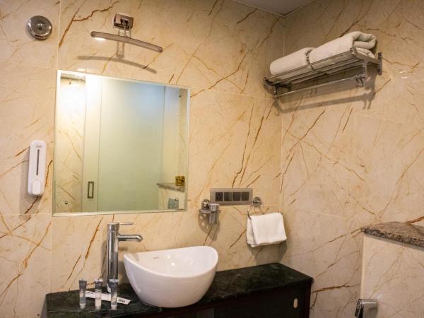 Mystic Apartotel Hebbal : photo 5 de la chambre suite deluxe avec lit king-size