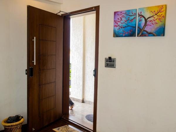 Mystic Apartotel Hebbal : photo 10 de la chambre suite deluxe avec lit king-size