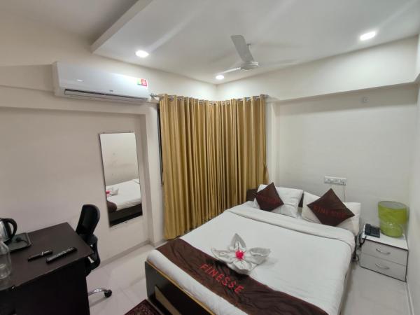 V Check Inn Residence : photo 1 de la chambre chambre lit king-size supérieure