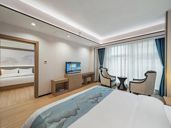 Evening Breeze Hotel 晚风酒店 : photo 2 de la chambre suite familiale deluxe