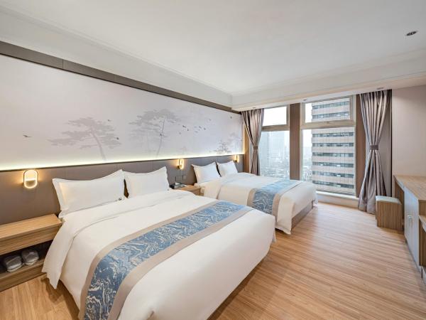 Evening Breeze Hotel 晚风酒店 : photo 3 de la chambre suite familiale deluxe