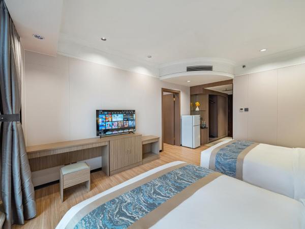 Evening Breeze Hotel 晚风酒店 : photo 6 de la chambre suite familiale deluxe