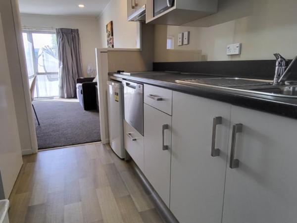 Manukau Motor Lodge : photo 3 de la chambre appartement en duplex