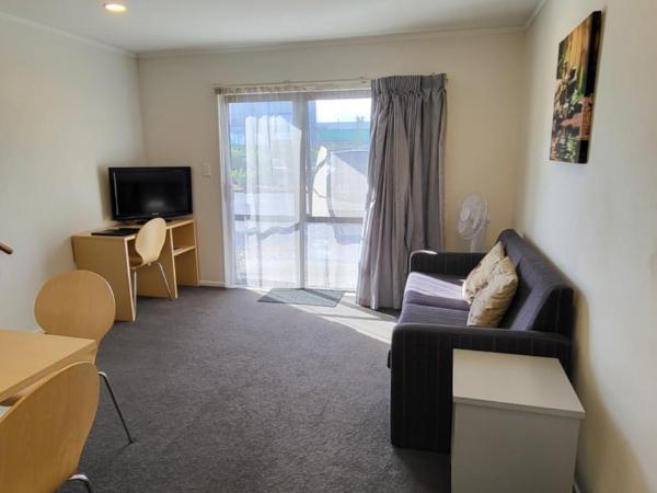 Manukau Motor Lodge : photo 2 de la chambre appartement en duplex