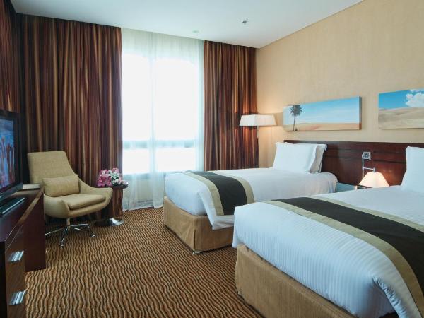 City Seasons Hotel & Suites Muscat : photo 3 de la chambre chambre familiale
