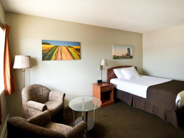Riviera Motor Inn : photo 2 de la chambre suite lit queen-size