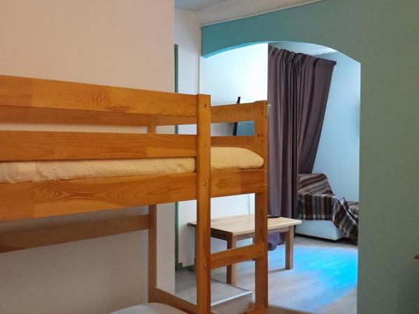 Hôtel-restaurant le Palais : photo 1 de la chambre chambre familiale (2 adultes et 2 enfants)