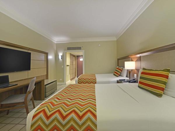 Hotel Deville Prime Salvador : photo 1 de la chambre chambre de luxe avec 2 lits doubles