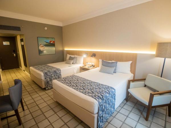 Hotel Deville Prime Salvador : photo 2 de la chambre superior luxury room with 2 double beds and partial sea view