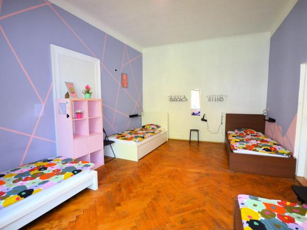Travel&Joy backpackers : photo 1 de la chambre chambre quadruple standard avec salle de bains commune