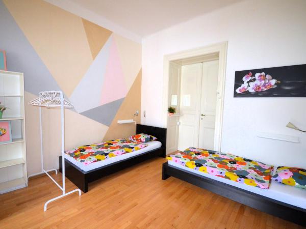 Travel&Joy backpackers : photo 7 de la chambre chambre quadruple avec salle de bains commune