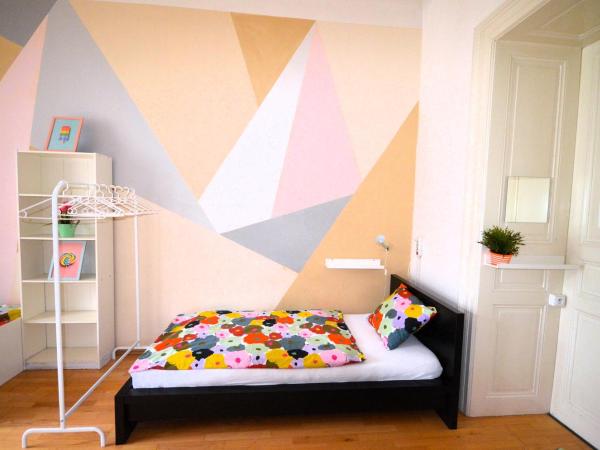 Travel&Joy backpackers : photo 3 de la chambre chambre quadruple avec salle de bains commune