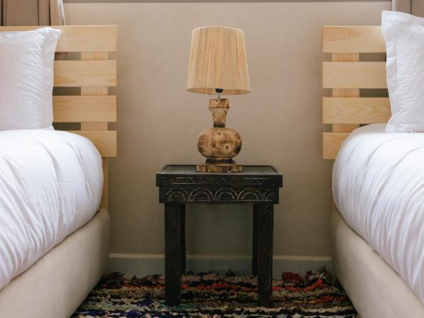 Flo Surf Morocco : photo 3 de la chambre chambre lits jumeaux