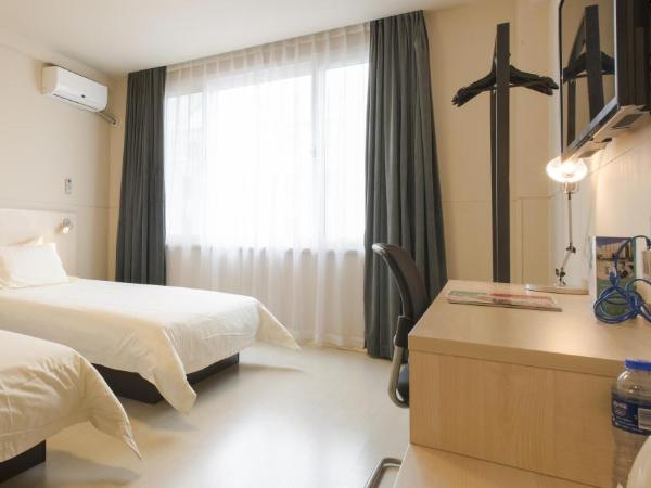 Jinjiang Inn Dalian Lianhe Road : photo 1 de la chambre chambre lits jumeaux standard a