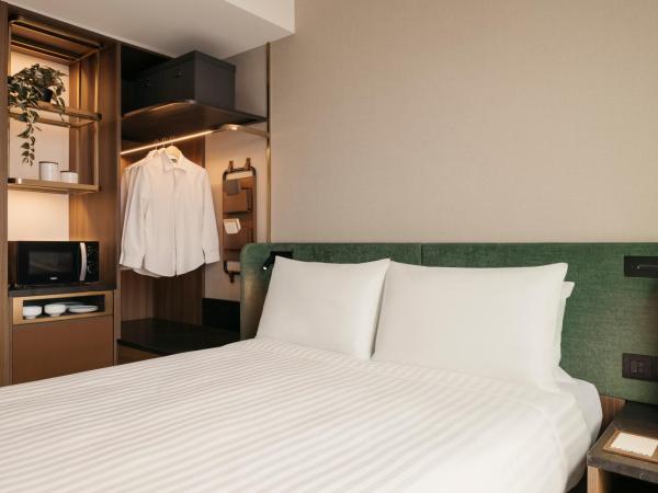 Quincy House Singapore : photo 5 de la chambre chambre lit queen-size deluxe