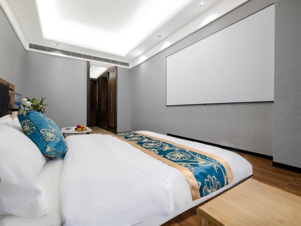 Xingyin Cloudy Hotel Guangzhou Changgang Subway Station - Free Shuttle Bus to Canton Fair Complex During Canton Fair Period : photo 9 de la chambre chambre lit king-size - vue sur ville