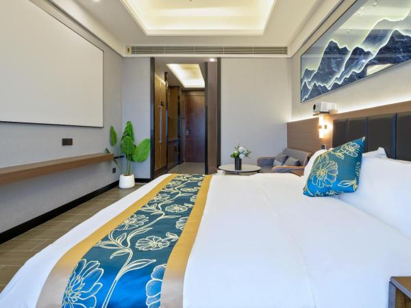 Xingyin Cloudy Hotel Guangzhou Changgang Subway Station - Free Shuttle Bus to Canton Fair Complex During Canton Fair Period : photo 10 de la chambre chambre lit king-size - vue sur ville
