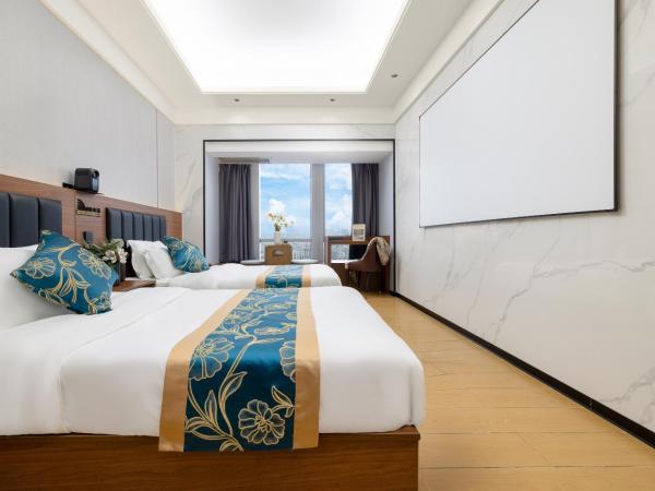Xingyin Cloudy Hotel Guangzhou Changgang Subway Station - Free Shuttle Bus to Canton Fair Complex During Canton Fair Period : photo 1 de la chambre chambre lits jumeaux - vue sur ville