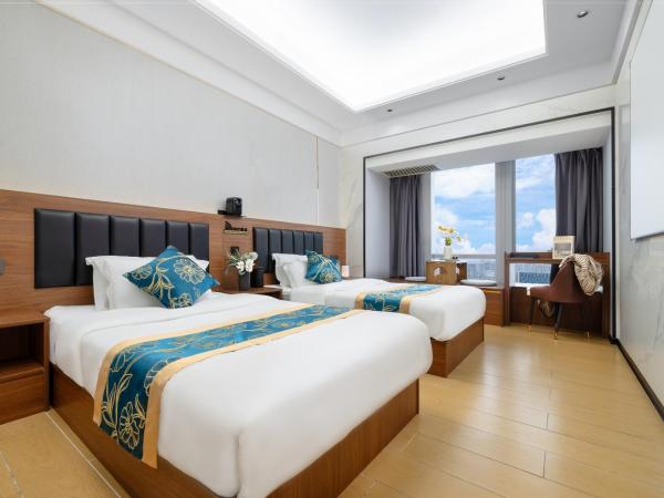 Xingyin Cloudy Hotel Guangzhou Changgang Subway Station - Free Shuttle Bus to Canton Fair Complex During Canton Fair Period : photo 2 de la chambre chambre lits jumeaux - vue sur ville