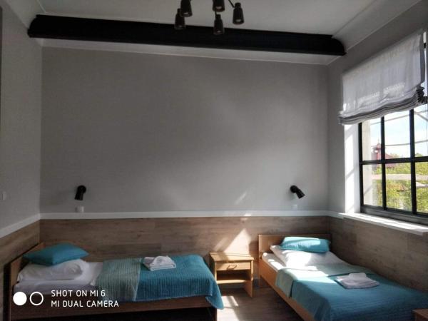 Ośrodek Wczasowy Temida : photo 1 de la chambre chambre quadruple (2 adultes + 2 enfants)