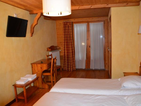 Hôtel Alpis Cottia : photo 4 de la chambre chambre lits jumeaux