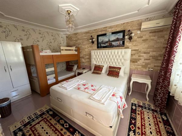 Sinter Terasse House Hotel : photo 1 de la chambre chambre quadruple - vue sur jardin