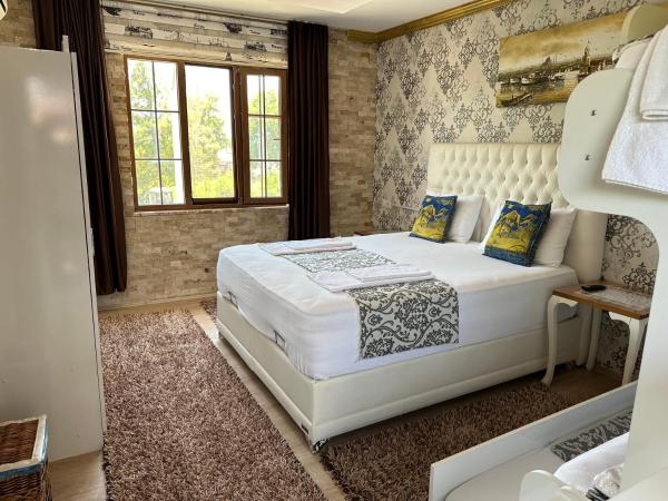 Sinter Terasse House Hotel : photo 3 de la chambre chambre familiale - vue sur jardin