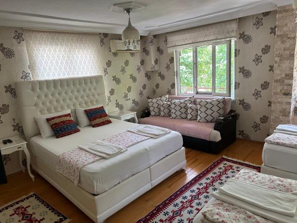 Sinter Terasse House Hotel : photo 2 de la chambre chambre quadruple supérieure 