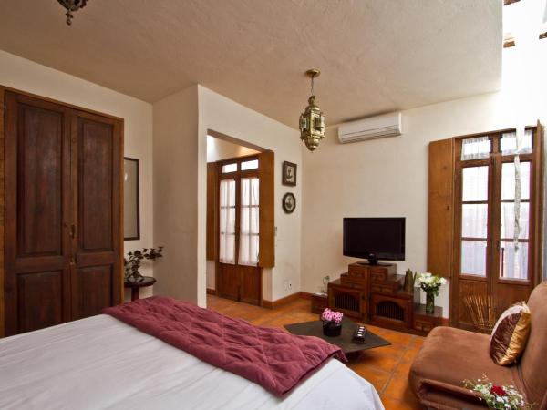 La Casa del Naranjo Hotel Boutique : photo 4 de la chambre chambre avec 2 grands lits queen-size