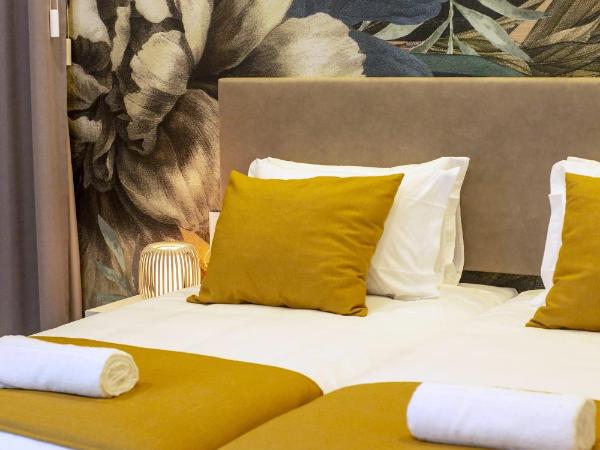 Guest House Jacarandá Faro : photo 8 de la chambre chambre lits jumeaux