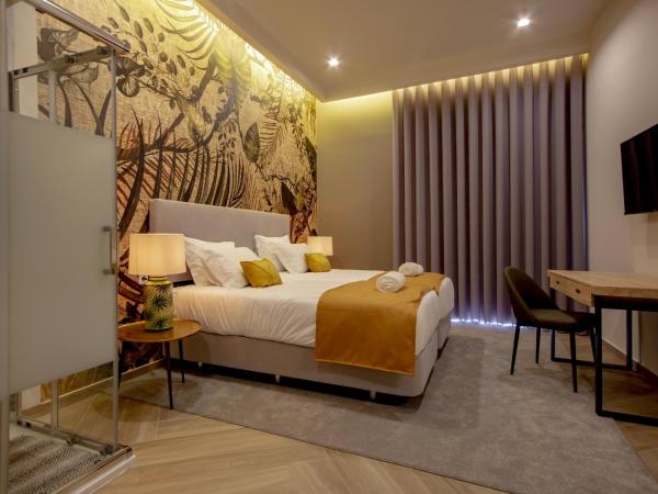 Guest House Jacarandá Faro : photo 9 de la chambre chambre lits jumeaux