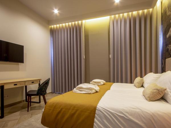 Guest House Jacarandá Faro : photo 5 de la chambre chambre lits jumeaux