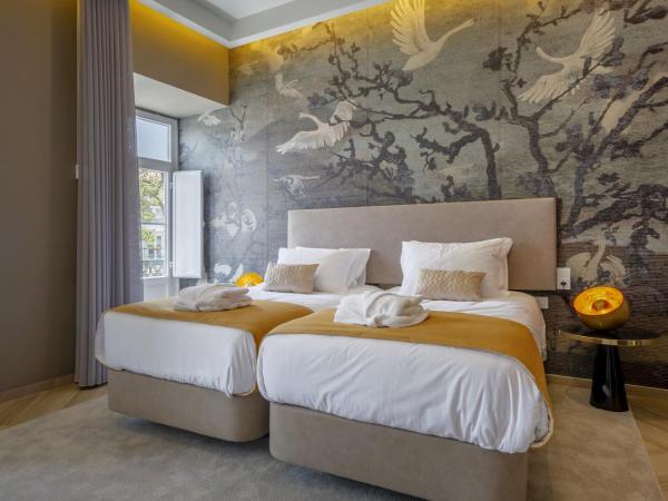 Guest House Jacarandá Faro : photo 6 de la chambre chambre lits jumeaux