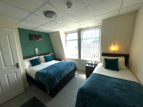 The Aspire : photo 1 de la chambre chambre triple