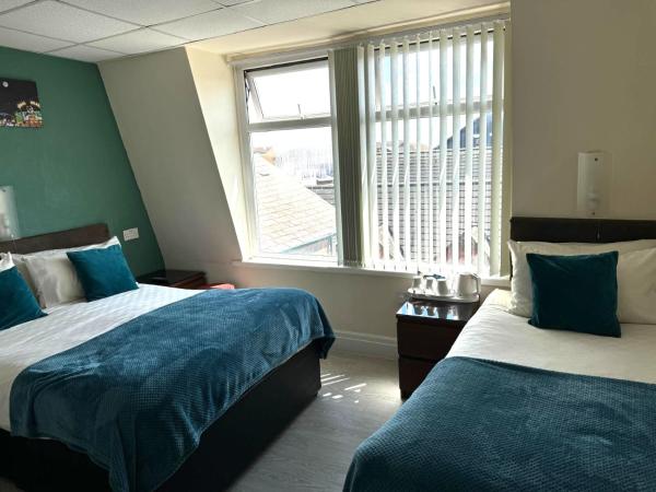 The Aspire : photo 4 de la chambre chambre triple