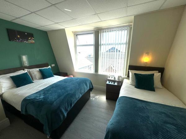 The Aspire : photo 2 de la chambre chambre triple