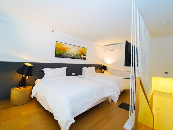 上海芳甸路地铁站Boutique酒店 : photo 2 de la chambre chambre lits jumeaux deluxe