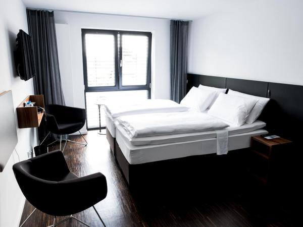 &REPEAT Köln Airport : photo 1 de la chambre chambre double ou lits jumeaux