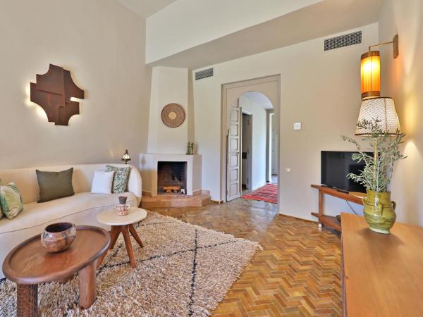 Domaine Des Remparts Hotel & Spa : photo 4 de la chambre villa - vue sur jardin