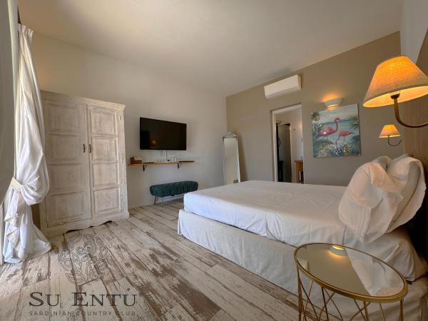 Su Entu Sardinian Country Club : photo 5 de la chambre chambre deluxe - vue sur jardin