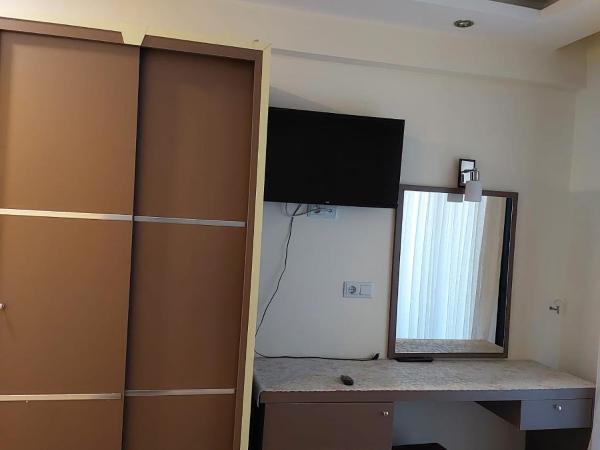 Falcon Home Otel : photo 2 de la chambre grande chambre double